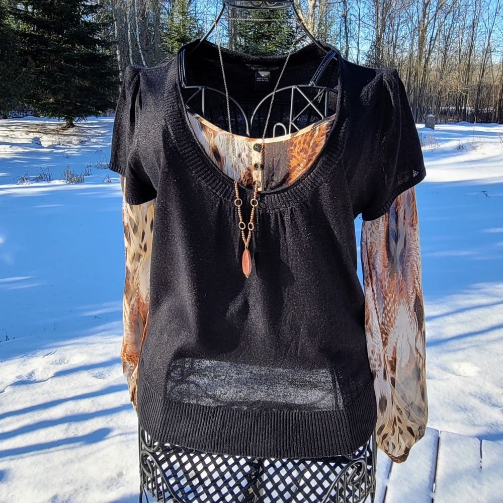 August Silk mock layer sweater, size M.  Black with animal print.